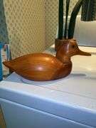 Wide variety of handcrafted wooden flowers, angels and animals