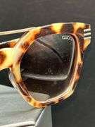 Pair of REPRODUCTION GUCCI leopard print sunglasses…..lens have slight scratching