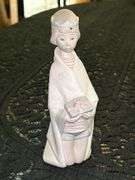 LLADRO Young King Melchior Nativity Bisque Porcelain Figurine (#4673)…..6-3/4” tall….part of the Children's Nativity Wiseman Series