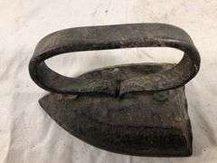 Vintage primative SAD iron/door stop. 6” L x 3.75”W x 4”H.