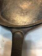 Vintage cast iron skillet with lid. 2 spout. 10” diameter. No spin, no wobble. No markings except an A in the lid.