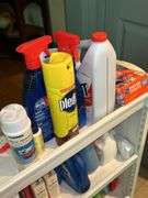 Slide-in laundry caddy and contents…..24-3/4 x 8-1/4 x 31-1/2 tall…..all contents are partial boxes and bottles