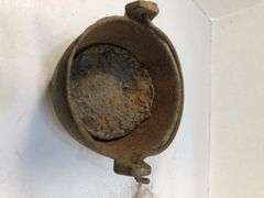 Antique smelting pot. 5” diameter. Plus round block of metal.