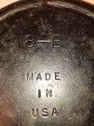 Griswold No. 8 cast iron skillet, identifiable by the "8-B" and "MADE IN USA". MM: D2