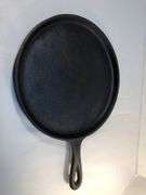 Lodge 9” old style griddle. USA  H 70G. Newly seasoned.