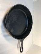 Lodge 10 1/2” 2 spout skillet with heat ring. No spin, no wobble.