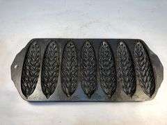 Rare Griswold No. 2700 wheat/corn design cornbread stick pan. #632. Erie, PA.  USA.  13 x 6”. Valued at $475 to 600.