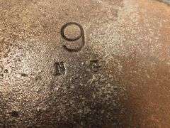 Wagner Ware cast iron griddle, specifically a No. 9 Sidney Arc Logo  Griddle. H G. 10.5” diameter. HS marked. No spin, no wobble.