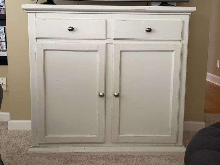 Cream colored solid wood cabinet with 2 drawers and bottom storage…..42 x 18-1/2 x 38 tall…..OTHER CONTENTS NOT INCLUDED image