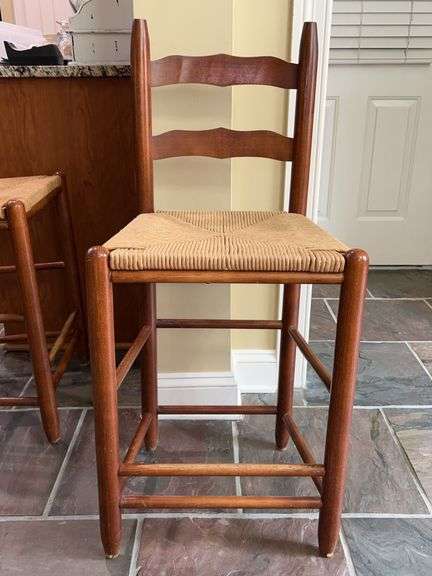 Vintage Oakwood Bar Stool with Rush Seating…..does show wear (possibly from vacuum) but is a sturdy piece…..17-1/2 x 13-3/4 x 24 tall to seat (38” tall overall) image