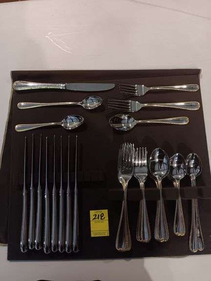 Gotham silverware.. beautiful with gold trim..see description image