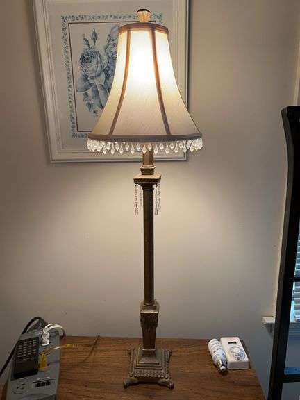 Metal and resin base candlestick with silk-like tasseled shade……32-1/2” tall image