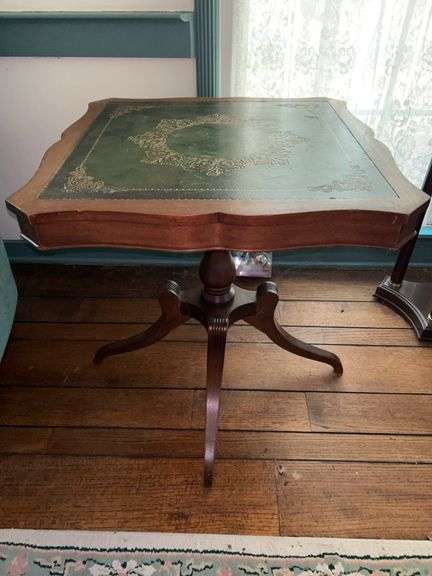 Vintage mahogany faux leather gold embossed top accent table…..25-3/4 square x 28 tall…..top has scratching image