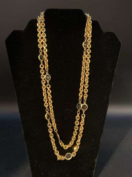Gorgeous longer gold-tone link necklace with black prism stones image