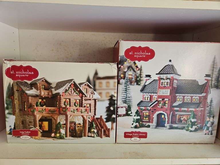 Two(2) St. Nicholas Square illuminated houses... image
