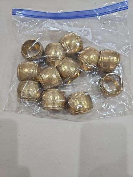 Set of twelve(12) very nice brass napkin rings... image