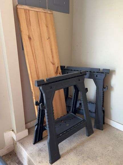 Pair of Blue Hawk heavy plastic sawhorses with handcrafted wood worktop image