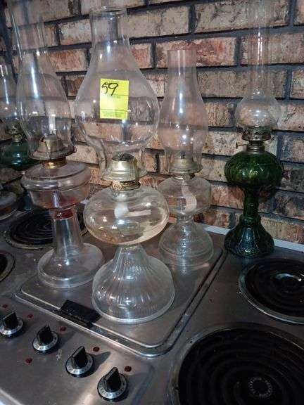 4 vintage oil lamps..see photos image