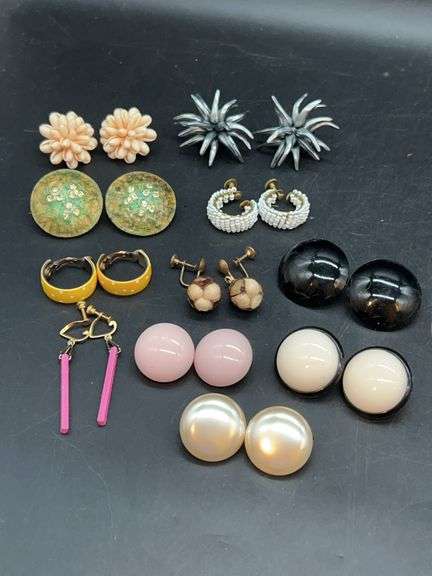 Selection of various styles and color clip on and screw back earrings image