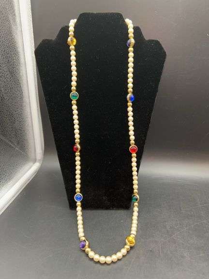 Longer pearl-like beaded necklace with multi-colored bead separators image