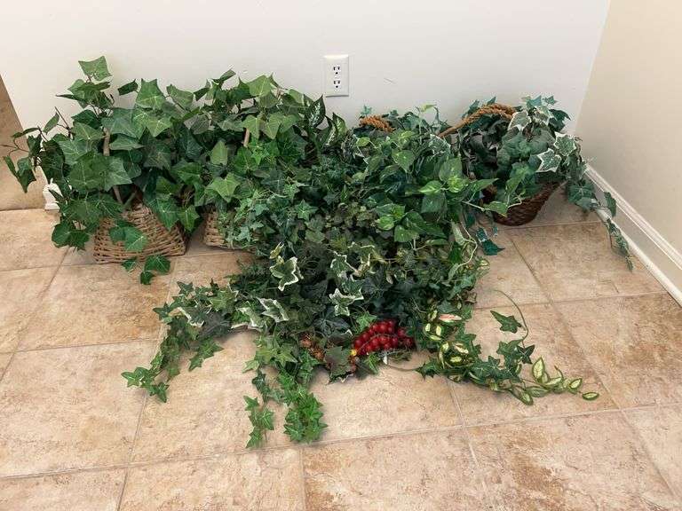 4 baskets with artificial greenery and additional loose greenery……2 of the baskets are hanging baskets image