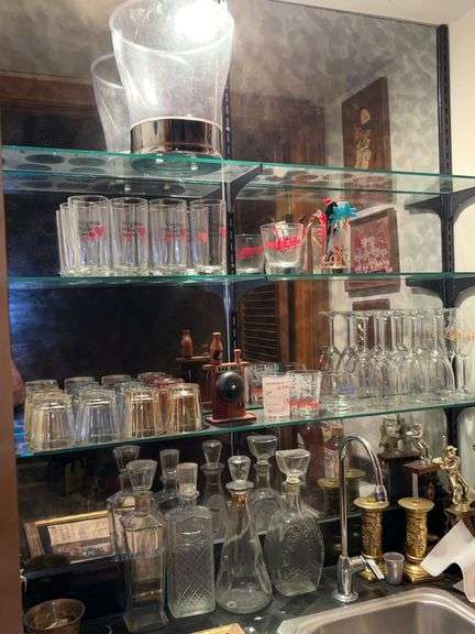 Contents of bar area…..glassware and decanters image