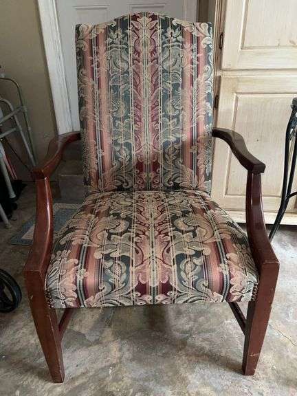 Very nice mahogany arm chair with reds/greens/tans upholstery…..27 x 20 x 40 tall overall…..blemishes on legs from normal use image