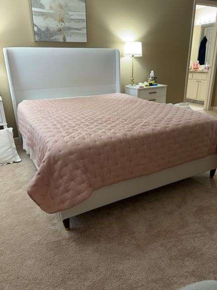 Beautiful queen size bed and mattresses…..headboard is wing back style covered in light gray linen fabric as are the footboard and side boards…..LINENS ARE NOT INCLUDED image