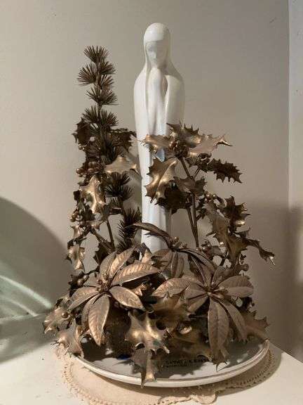 White porcelain Madonna statue with gold-tone decor image