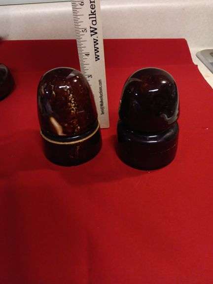 2 brown ceramic insulators image