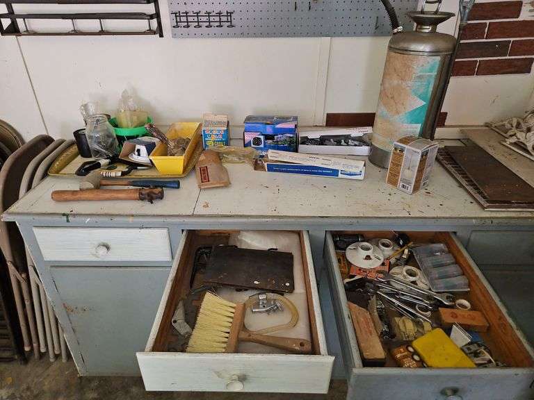 Contents on top of counter and two drawers in cabinet in garage PLUS contents on two shelves on other side of garage SEE ALL PICS FOR DETAILS... image