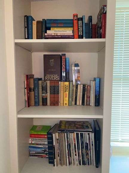 Contents of books on 3 shelves…..bottom is mostly vintage Southern Living magazines, middle and top are a mixture of novels and other image