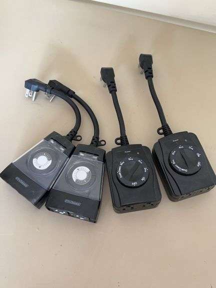 Set of (4) automatic light times…..great accessory for Christmas and other outdoor lighting image
