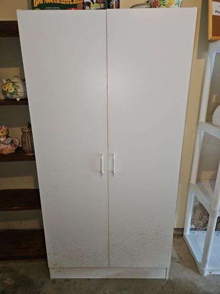 White storage cabinet 29.5x15.5x59.25 CONTENTS IN AND OWN NOT INCLUDED... image