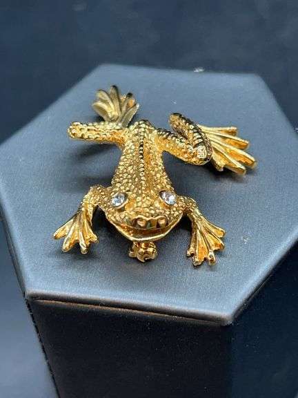St. John shiny gold-tone frog brooch with clear stone eyes image