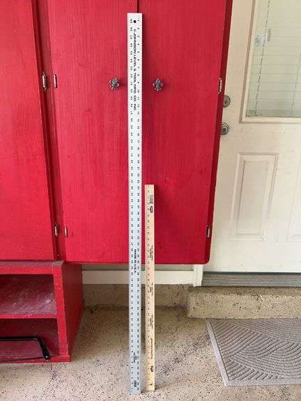(1) Johnson Level & Tool Mfg. Co. Inc. 5 ft aluminum straight edge and (1) Lowe’s wooden yardstick image