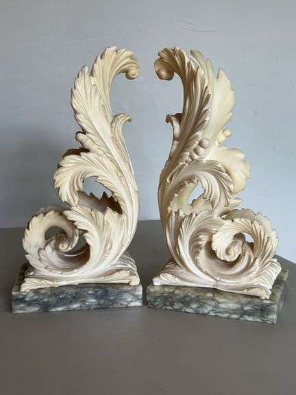Pair of ornately designed bookends on StoneLite bases…..10-1/4” tall image