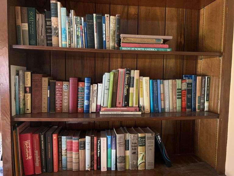 3 shelves of books of various genres and by various authors image