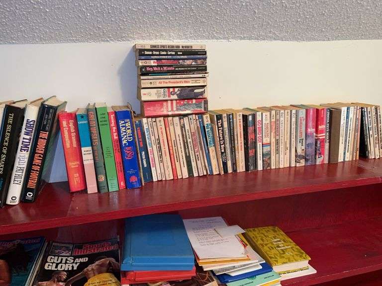 Grouping of sports related and other paperback and hardback books image