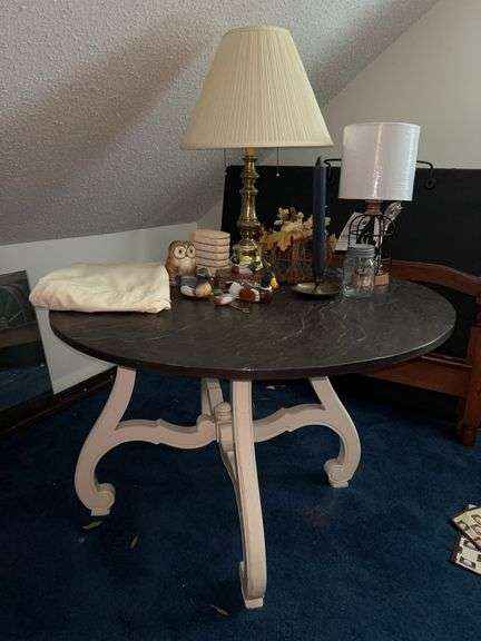49”D x 27” tall round pedestal table and contents…..includes linen tablecloth image
