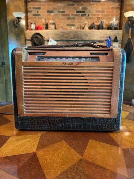 Vintage 1940s Philco Wooden Roll Top Case Portable Radio…..does come on and tuning/volume controls turn very easily…..could not get a station to pick up but it tries…..leather carry strap is damaged image