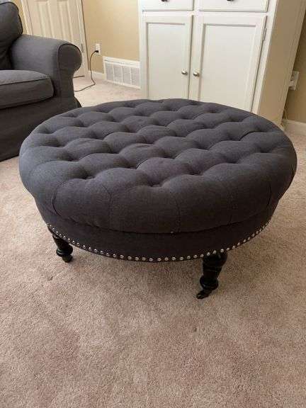 Isabelle gray linen tufted ottoman with casters……34”D x 18” tall image