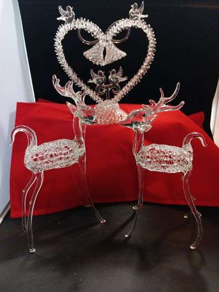 Hand.
Hand blown reindeer and wedding cake topper image