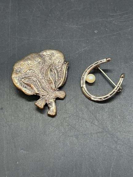 2 sterling brooches…..cotton boll and horseshoe with pearl-like bead…..9 grams total image