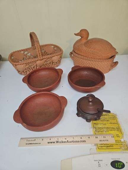 Collection of terra cotta and earthen clay pieces... image