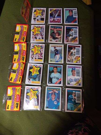Five unopened packs of Topps baseball cards see photos image
