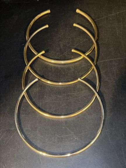 (4) collared metal chokers…..3 gold tone and 1 silver tone image