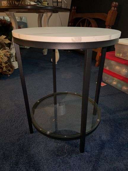 Round black metal base table with wood marble-look top and glass bottom…..17-3/4”D x 21-1/2” tall image