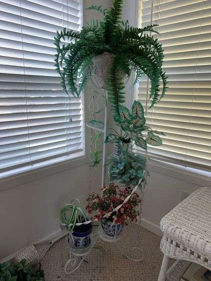 Wrought Iron spiral plant stand with pots and artificials…..stand is 49-1/2” tall image