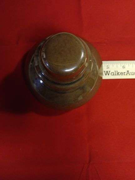 Light brown ceramic insulator..4 1/2".no chips or cracks just  needs cleaned. see photos image